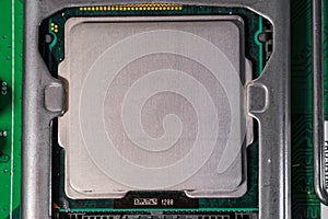 Close-up view of a computerâ€™s central processing unit (CPU) mounted on a motherboard