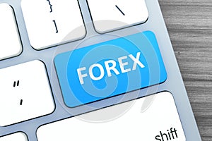 Close-up view on conceptual computer keyboard with forex button