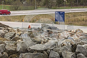 Close up view of construction imploding works on rocky terrain. Sweden.
