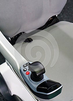 Close-up view of controls of automated wheel chair for old,sick and disabled people