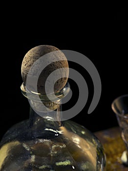 tequila anejo and glasses on dark background photo