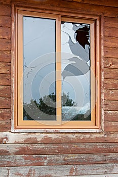 Close up view of cracked and broken glass window