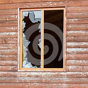 Close up view of cracked and broken glass window