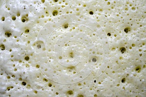 Close-up view of crepes dough, pancakes during the cooking process