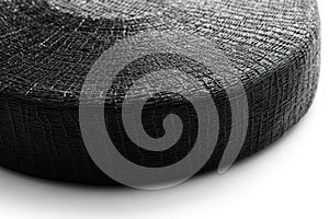 Close-up of a Roll of Black Woven Mesh Fabric