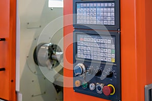 close up view of dashboard of CNC lathe machinery.