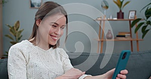 Close up view of deaf woman having video conversation and showing with sign language phrase Happy for you. Joyful female