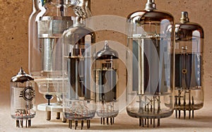 Close up view of different vintage electronic vacuum tubes.