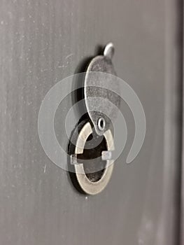 Close-up view of the door peephole.