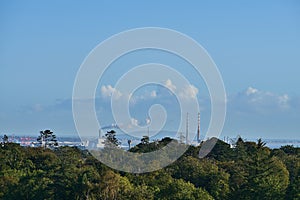 Close up view of Dublin Waste to Energy (Covanta Plant)  Poolbeg CCGT  Pigeon House Power Station and UCD Water Tower