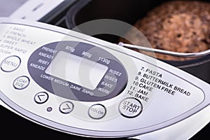 Close-up view of electric bread maker digital display