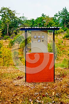 Close-up view of the electrical panel in the field