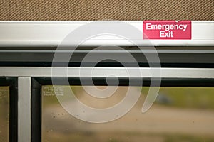 Close up view of an emergency exit sign inside