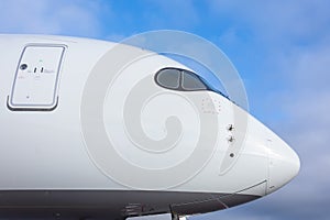 Close up view of empty pilot cabin of passenger jet airplane