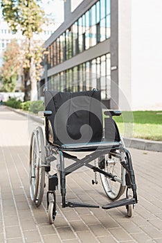 close-up view of empty wheelchair outside