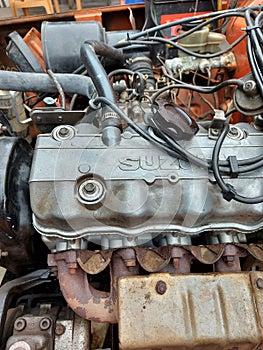 Close-up view of engine bay of a suzuki katana car.