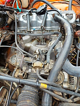 Close-up view of engine bay of a suzuki katana car.