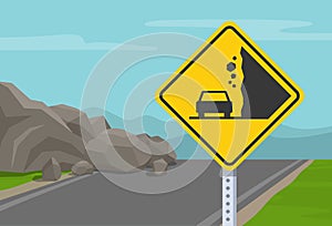 Close up view of falling rocks road or traffic sign. Landslides and rockfalls on the road in the mountains.