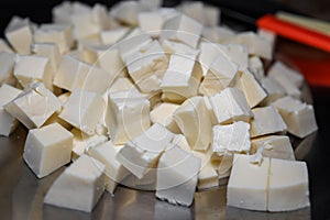 Close up view of famous Indian food ingredient Paneer cut in cubes