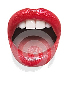 Close-up view of female wearing red lipstick with mouth open over white background photo