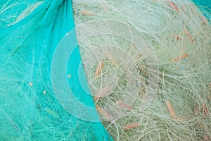 Close up view of fishing net marine background