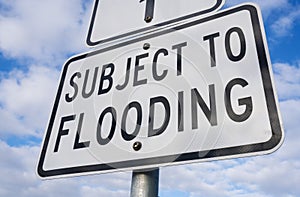 Close-up view of a flooding sign