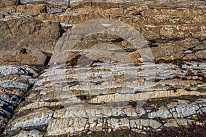 Close up view of Flysch geological coastline, rocks of Flysch formations in Zumaya in the Basque Country, Spain photo