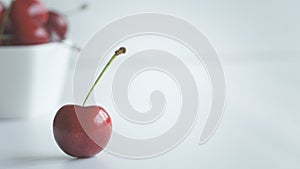 Close up view of fresh fruit sweet ripe cherry with water droplets. Fresh antioxidants diet summer fruits