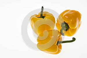Close up view of fresh yellow paprika isolated on white background. Healthy eating concept
