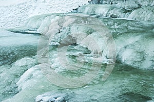 Close-up view of frozen water cascade