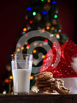 Close up view of glass of milk with cookies