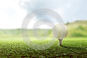 Close up view of golf tee with the ball