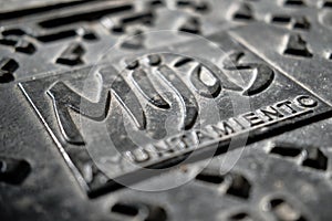 Close up view gray color sewer manhole in Mijas spanish village