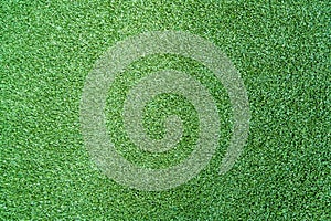 Close up view of green grass or lawn from above, a play ground or field. Pattern and Textured concept.