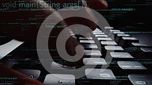Close-up View of Hands Typing on a Dark Keyboard Surrounded by Code, Representing Programming, Coding, and Technology in