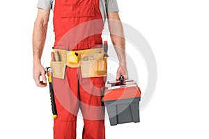 Close-up view of handyman holding toolbox