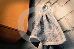 Close-Up View of a Hanging Towel on a Modern Bathroom Ring