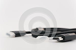close up view of HDMI connector and cable on a white desktop