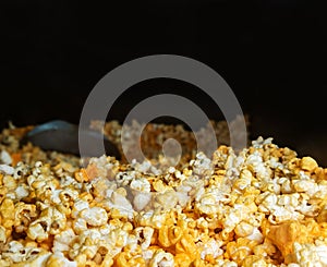 Close up view of heaped yellow isolated cheese pop corn