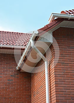 Close up view on House Problem Areas for Rain Gutter Waterproofing Outdoor. Home Guttering, Gutters, Plastic Guttering System,