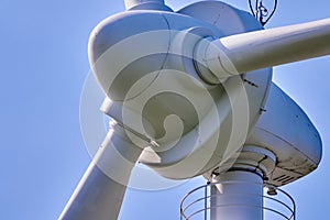 Close-up view of the hub of a wind turbine rotor.