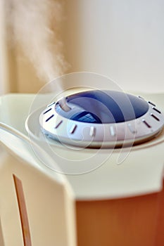 Close-up view of the humidifier working in the room