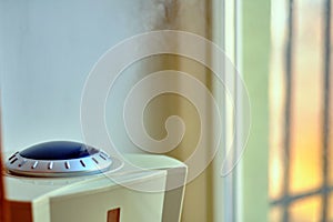 Close-up view of the humidifier working in the room photo
