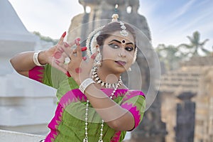 Close up view of indian classical odissi dancer posing at Lingaraja temple. Indian tradition.