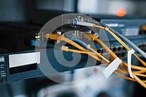 Close up view of internet equipment and cables in the server room