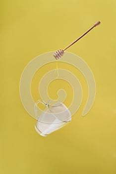 Close up view of levitating cup of milk