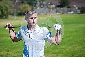 Close up view of a male golfer