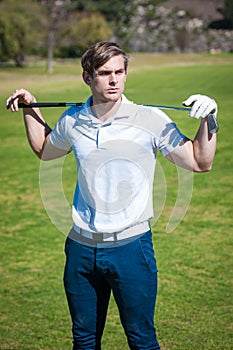 Close up view of a male golfer