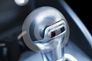 Close up view of a manual gear lever shift. Manual gearbox. Car interior details. Car transmission close up