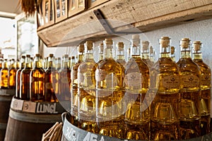 close-up view of many bottles of Muscatel wine from the Camargue region of southern France